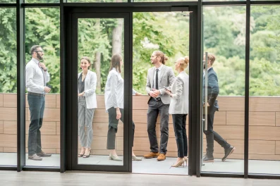 business-people-on-the-office-balcony-during-a-bre-2023-11-27-05-23-22-utc-min